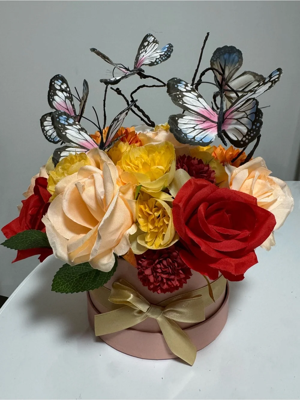 Elegant Pink Hatbox Floral Arrangement with Butterflies